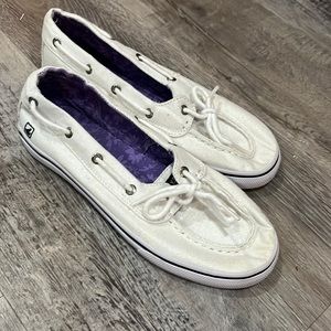 Girls Sperry Top Sider deck shoes.